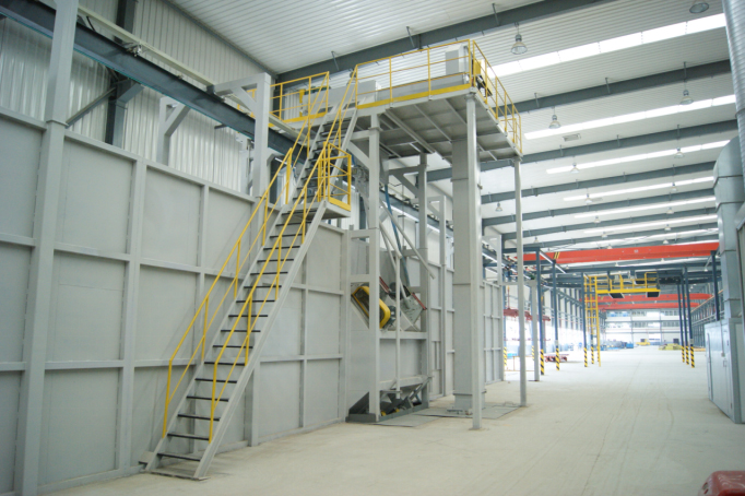 Product chain hanging conveyor blasting chamber