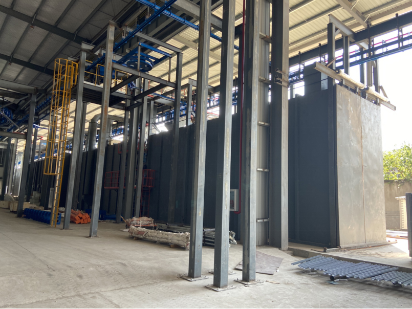 Product chain hanging conveyor blasting chamber