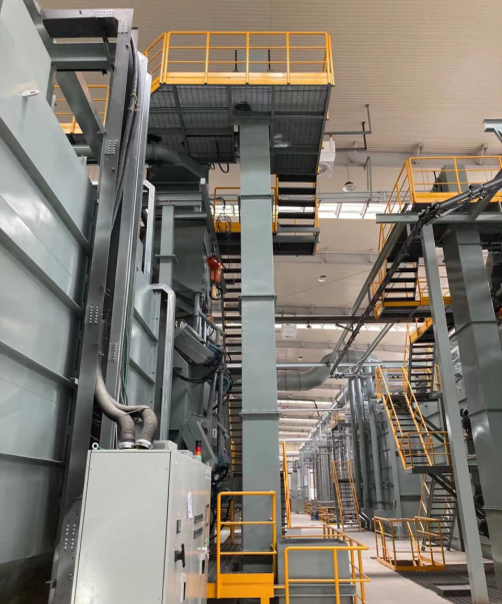 Product chain hanging conveyor blasting chamber