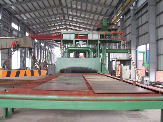 Roll through plate shot blasting pretreatment line